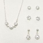 Sears Roebuck and Co. Silvertone/Crystal 4 Piece Earrings and 3-Stone Necklace Set