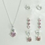 Sears Roebuck and Co. Silvertone/Crystal/Lt. Rose 4 Piece Earrings and Drop Pendant Set