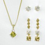Sears Roebuck and Co. Goldtone/Crystal/Topaz 4 Piece Earrings and Drop Pendant Set