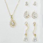 Sears Roebuck and Co. Silvertone/Goldtone/Crystal 4 Piece Earrings and Teardrop Pendant Set