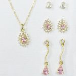 Sears Roebuck and Co. Silvertone/Goldtone/Lt. Rose 4 Piece Earrings and Teardrop Pendant Set