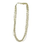 Apostrophe Goldtone Multi Strand with Stations Necklace