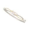 1/4 ct. tw.* Diamond Swirl Bangle