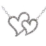 10K White Gold .20 ct. tw. Two Heart Diamond Pendant