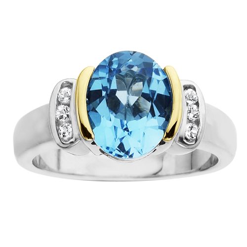 SG Blue and White Topaz Ring. 14K Yellow Gold and Sterling Silver