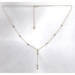 Sakoura Design Ltd. Tri color Y drop beaded Necklace with round faceted beads. 10k Yellow, White,