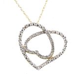 1/8 ct. tw. Diamond Pendant. 10K Yellow Gold