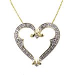 1/4 ct. tw. Diamond Heart Pendant. 10K Yellow Gold
