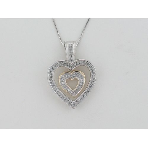 1/5 ct. tw. Diamond Heart Pendant. 10Kt Two Tone Gold