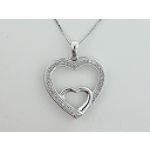 1/8 ct. tw. Diamond Cross Pendant. 10Kt White Gold