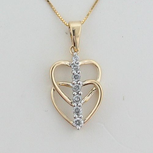 1/4 ct. tw. Diamond Heart Pendant. 10Kt Yellow Gold