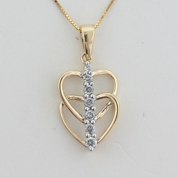 1/4 ct. tw. Diamond Heart Pendant. 10Kt Yellow Gold