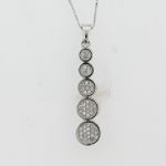 1/7 ct. tw. Diamond Pendant. 10Kt White Gold