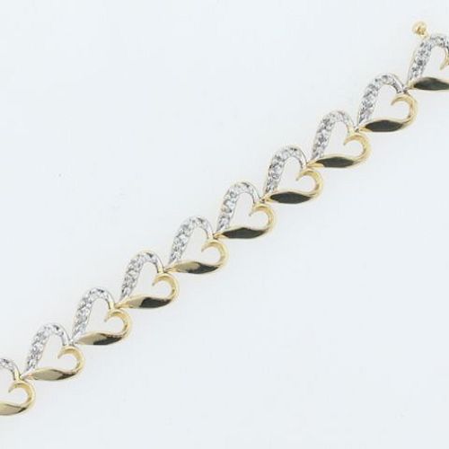 1/4 ct. tw. Diamond Heart Bracelet. 10Kt Yellow Gold