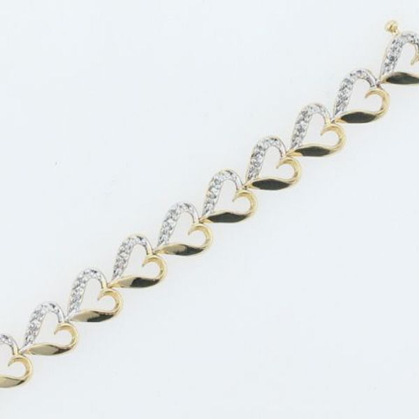 1/4 ct. tw. Diamond Heart Bracelet. 10Kt Yellow Gold