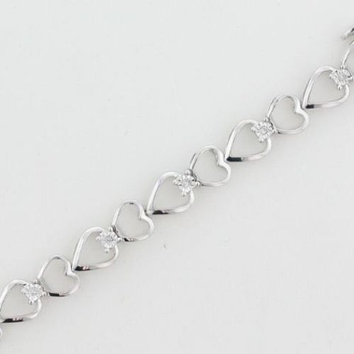 1/10 ct. tw. Diamond Heart Bracelet. 10Kt White Gold