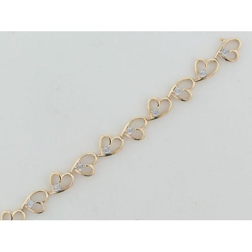 1/10 ct. tw. Diamond Heart Bracelet. 10Kt TwoTone Gold.