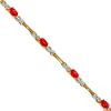 Oval Created Ruby with Diamond-Accent Link Bracelet in 10K Yellow Gold