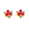 Oval Ruby with Diamond Accent Flower Stud Earrings in 10K Yellow Gold